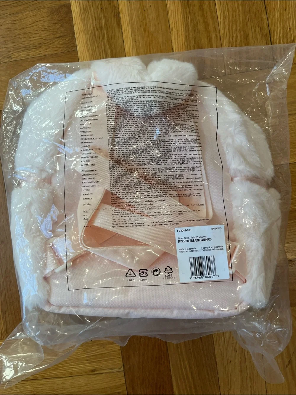 Nike Light Pink Faux Fur Mini Backpack